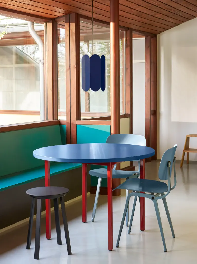 Two-Colour dia105 blue wb lacquer tabletop maroon red frame_Revolver Stool black_Arcs Shade cobalt blue.webp