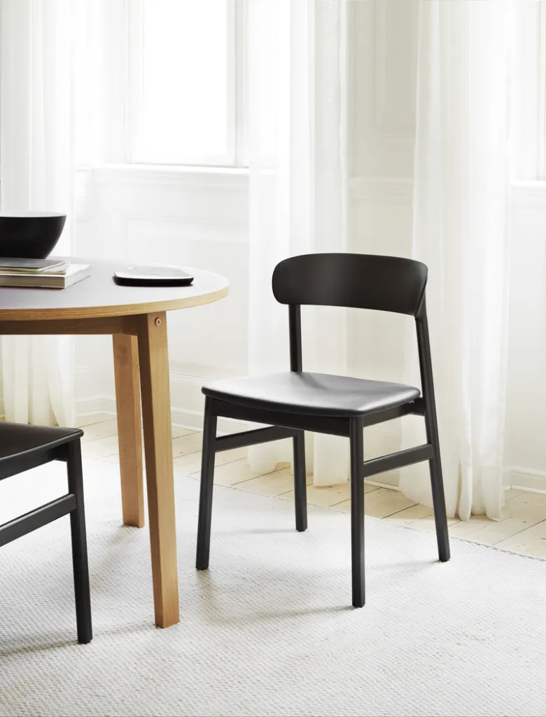 2020_Normann_Copenhagen_Herit_Chair_BlackBlack_Slice_Table_Ø120_Linoleum.webp