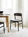 2020_Normann_Copenhagen_Herit_Chair_BlackBlack_Slice_Table_Ø120_Linoleum.webp