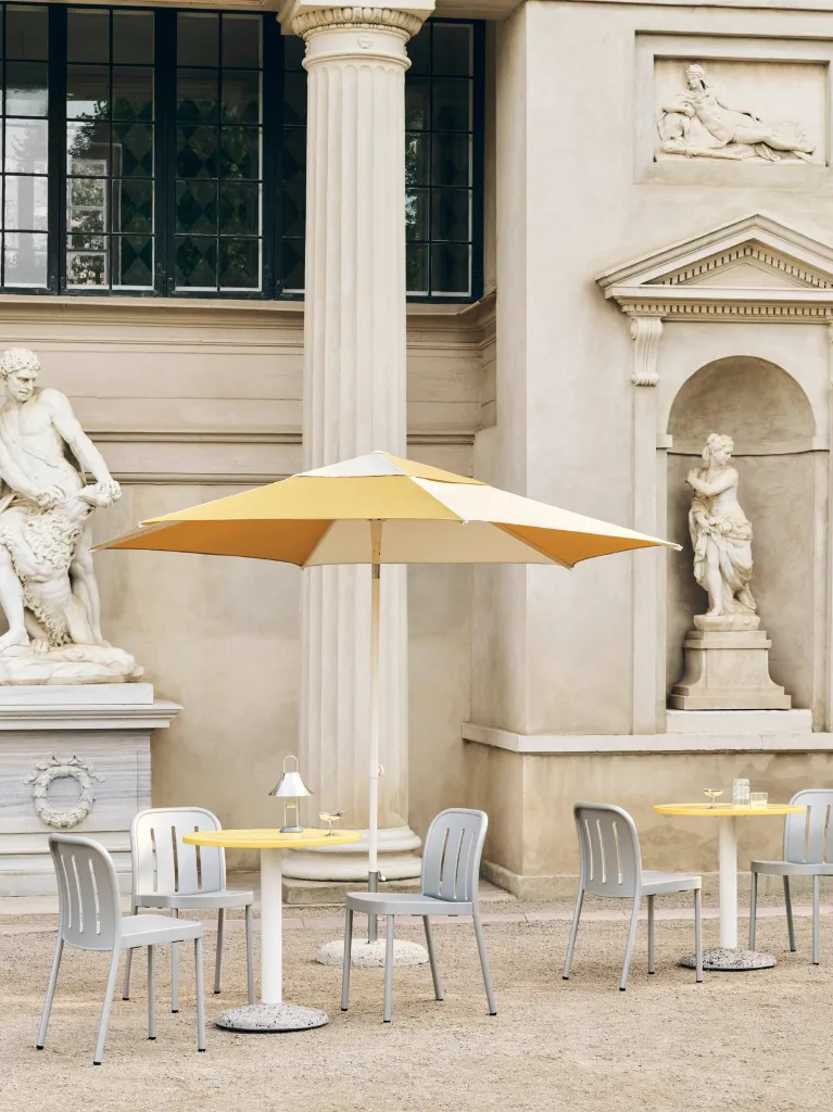Terrazza Parasol Hexagon off-white and ochre_Deville Chair silver grey_Ceramic Table bright yellow_Italian Dessert Cup.webp