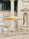 Terrazza Parasol Hexagon off-white and ochre_Deville Chair silver grey_Ceramic Table bright yellow_Italian Dessert Cup.webp