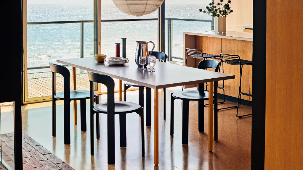 Two-Colour light grey wb lacquer valchromat tabletop_ochre powder coated steel_Rey Chair deep black wb lacquer beech_Hee Bar Stool black.webp